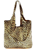 The Pussycat Tote. Soft Premium Leather meets Animal Print for the perfect blend of Function, Form and Fun. Small “Pouchette” included.
